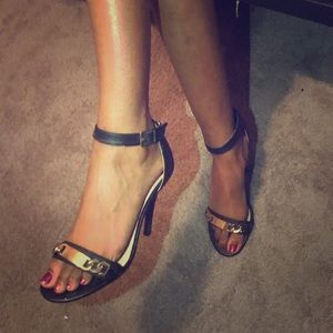 Black and gold high heels